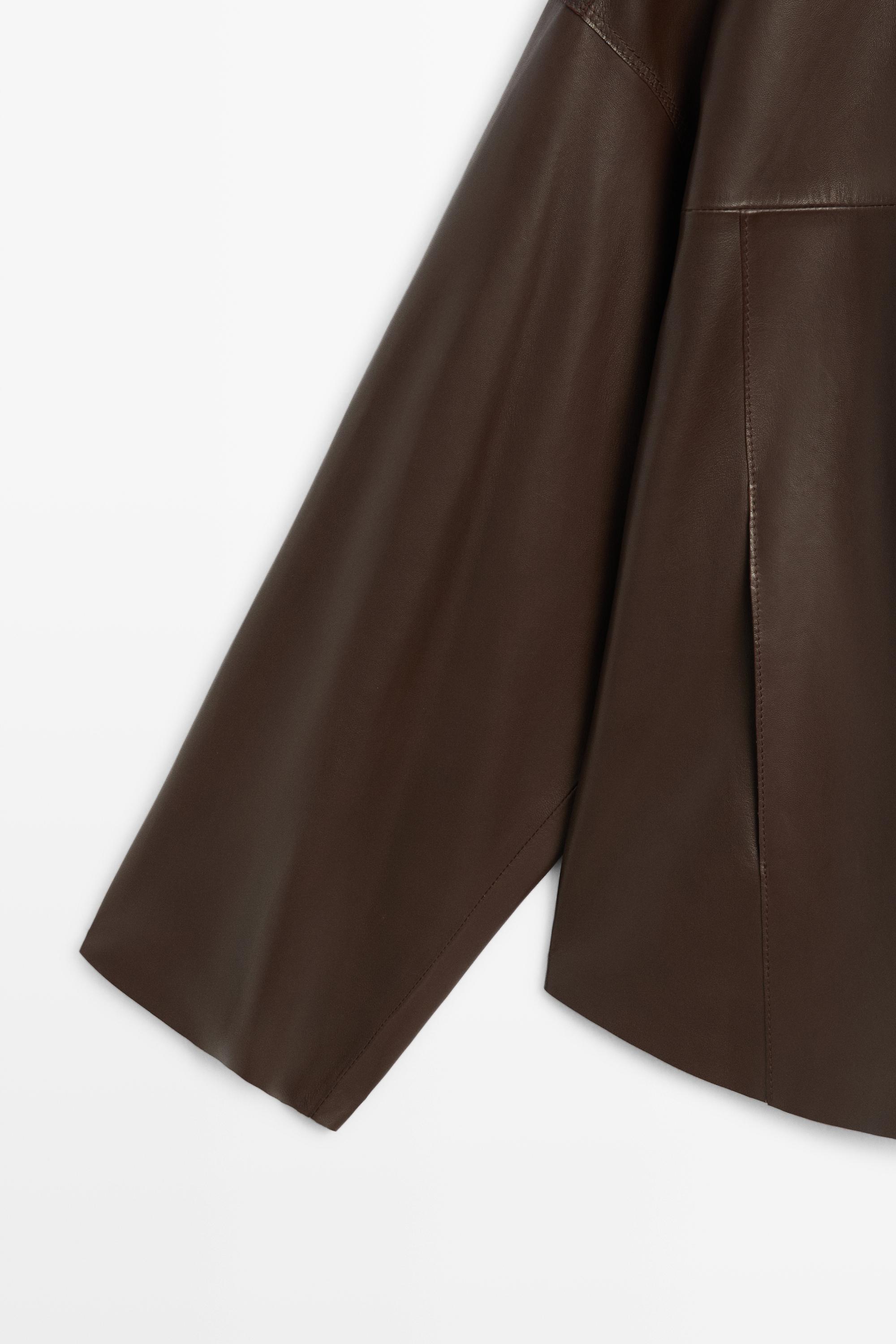 Veste en cuir nappa à fermeture sous patte